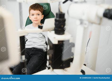 Boy Checks Eye Vision In Ophthalmology Clinic Stock Photo Image Of