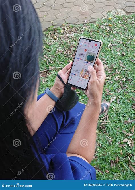 Editorial, Indonesia, 29 October 2022, Woman Scrolling Social Media at