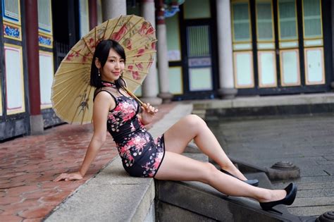 1368517 Asian Pose Brunette Girl Dress Legs Stilettos Glance