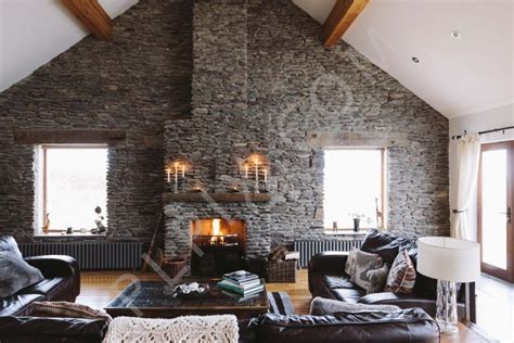 House with stone wall feature in the living room | Interior ...