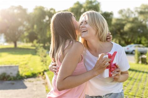 Free Photo Best Friends Hugging After Not Seeing Each Other In A Long