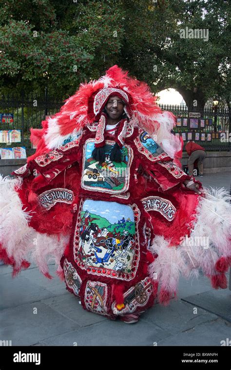 A Mardi Gras Indian shows off his costume in the French Quarter of New ...