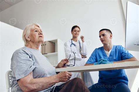 elderly patient at the doctor's and nurse's appointments in the medical ...