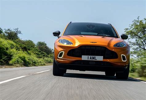 Colorful Aston Martin Dbx Looks Like The Proper Suv For The Future James Bond Autoevolution