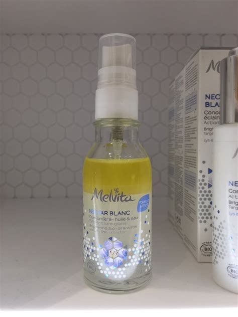 Melvita Nectar Blanc Duo lumière huile eau spray Exfoliant sans