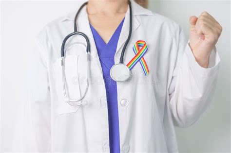 Doctor With Lgbtq Rainbow Ribbon For Support Lesbian Gay Bisexual Transgender And Community