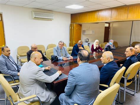 The Dean Of The College Of Medicine Chairs A Meeting Of The Directors