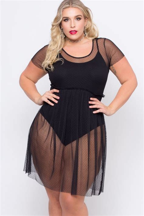 This Plus Size Stretch Knit Mesh Dress Features A Round Neckline Short Sleeves A Light Weight