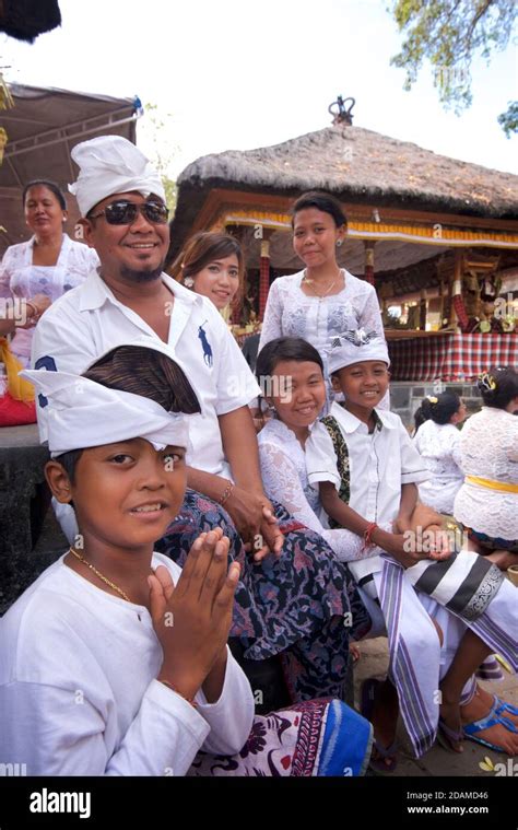 Balinese Hindu Templegoers At Sakenan Temple For Galungan Praying