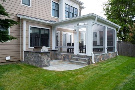 Elevated Flagstone Screen Room With Outdoor Kitchen Patio In Bethesda