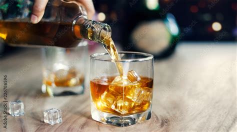 Man Pouring Whiskey Into Glasses Whisky Drink Alcoholic Beverage With