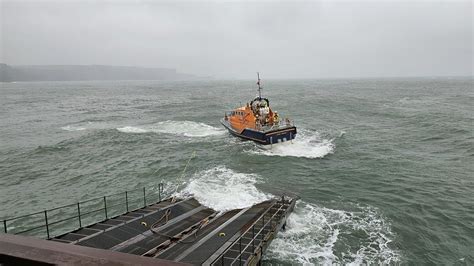 Tenby Rnli Lifeboat Launches Into The Rough Sea Remnants Of Hurricane