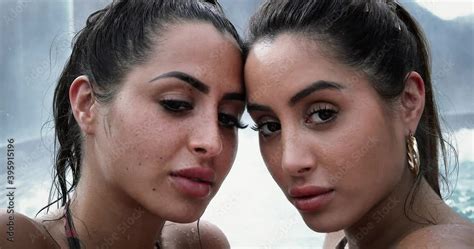 Close View Of A Portrait Of Women In A Jacuzzi Beautiful Twin Sisters