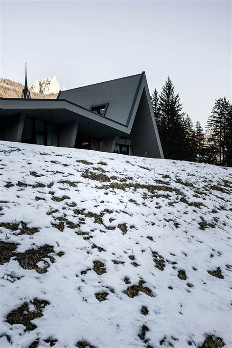 Zigzag roof defines character of Olympic Spa Hotel by NOA in the Alpine