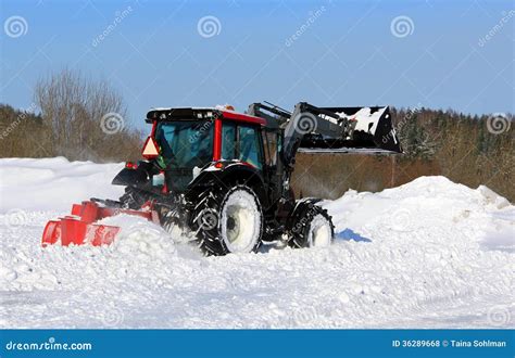 Tractor Plowing Snow On A Yard Stock Photo Image Of Moving Plough