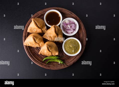 Veg potato Samosa with sauces, Homemade Fried Indian Samosa with Mint