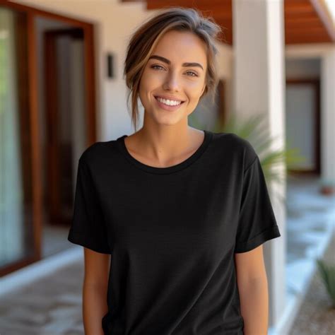 A Woman Wearing A Black Shirt With A Picture Of A Man On The Front