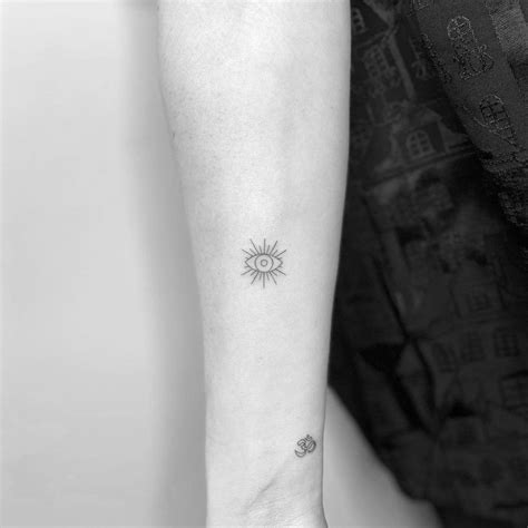 Minimalist Evil Eye Tattoo On The Inner Forearm