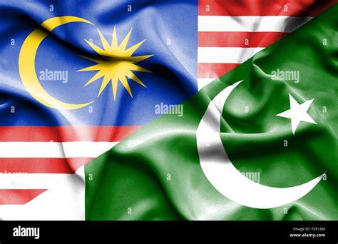 Waving flag of Pakistan and Malaysia Stock Photo - Alamy