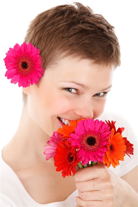 Woman Holding Flowers Free Stock Photo - Public Domain Pictures