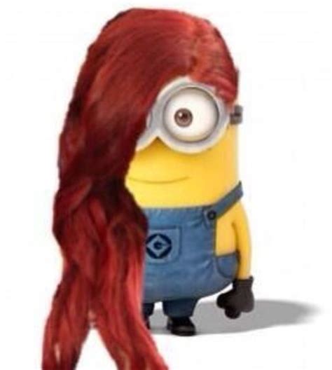 a woman with long red hair and a minion in the back, standing next to her