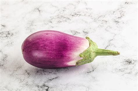 Premium Photo Raw Purple Ripe Eggplant For Cooking Over Background