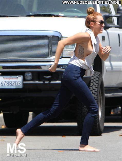 Miley Cyrus Braless Posing Hot Usa Beautiful Babe See Famous And