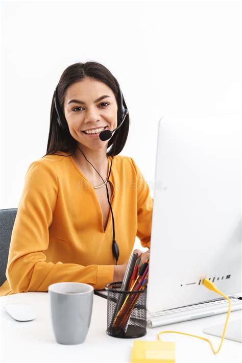 Portrait Of Beautiful Hotline Assistant Woman Wearing Microphone Headset Speaking With Customer