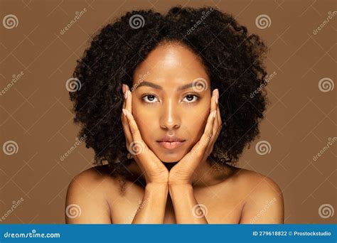 Closeup Of Beautiful Half Naked Black Woman Touching Her Face Stock