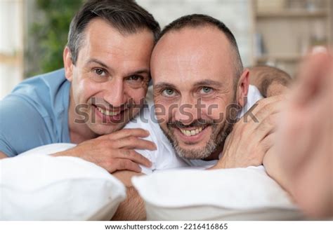 Happy Gay Couple Lying On Bed Stock Photo 2216416865 Shutterstock