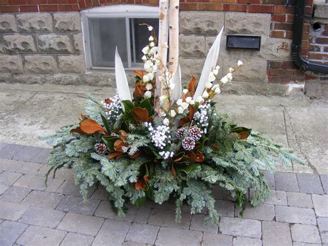 Winter outdoor planters in Toronto - Mondu Floral Design