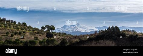 Panoramic view of the snow-capped Veleta, the second highest peak of ...