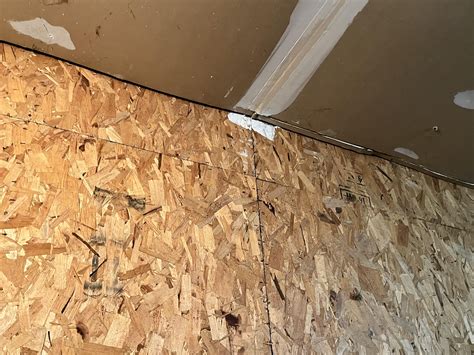 Townhouse Connected Garage Water Leaking Under Wall : r/DIY