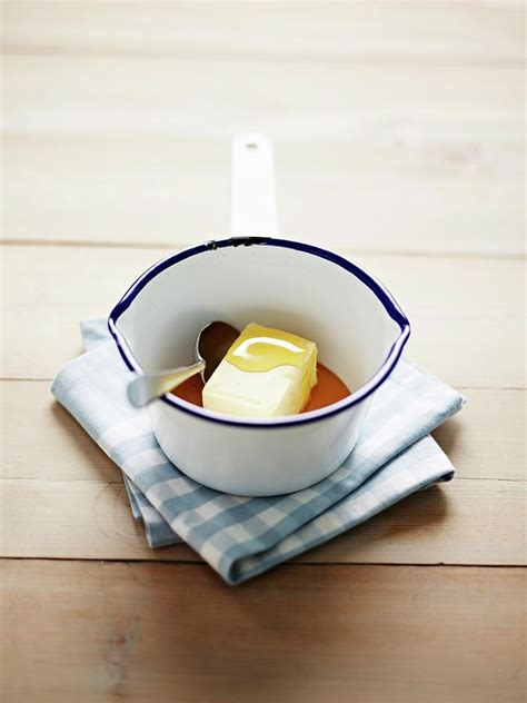 Block Of Butter Melting In An Enamel Saucepan Photograph by Will Shaddock Photography - Fine Art ...