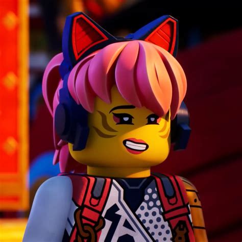 the lego movie character has pink hair and is wearing headphones on her ears,