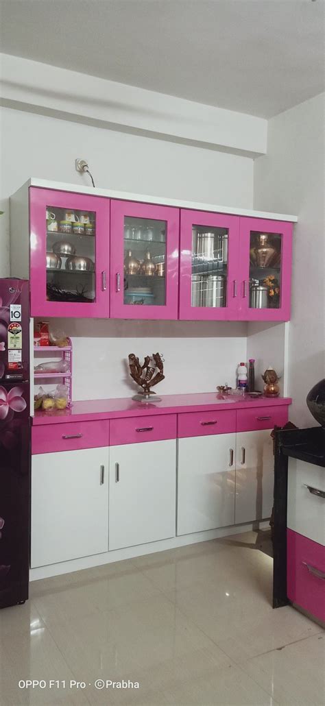 Modern Kitchen with Pink and White Cabinets