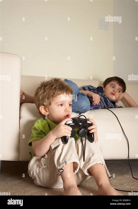 Boys Playing Video Games Stock Photo - Alamy