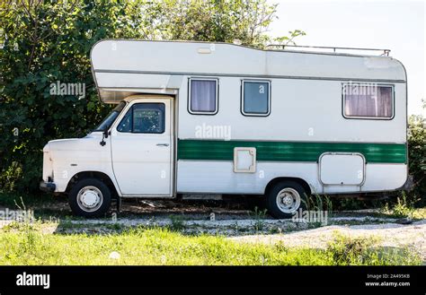 Old white camper bus. Vintage van. Tourism nostalgy concept with old ...