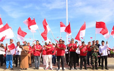 InfoPublik PEMBAGIAN 1O JUTA BENDERA MERAH PUTIH