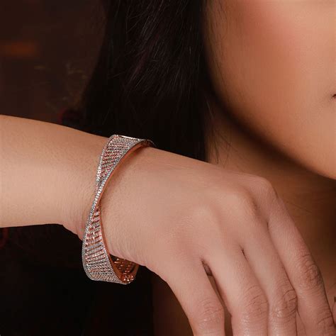 Buy Priyaasi Twisted Band American Diamond Rose Gold Plated Bracelet Online