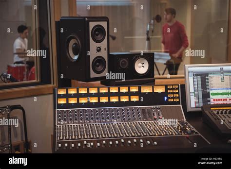 Sound mixer, speakers and equipment in music studio Stock Photo - Alamy