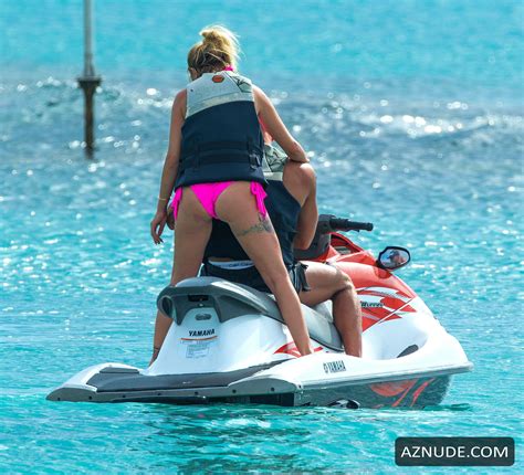 Olivia Buckland Sexy In Pink Bikini With Her Man On The Beach In Barbados AZNude