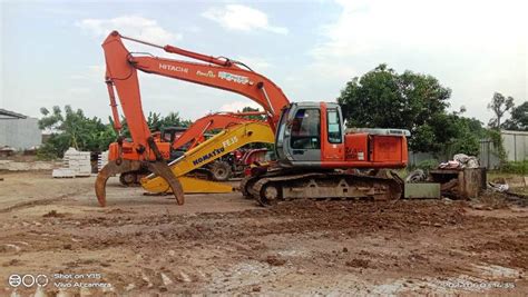 Sewa-Alat-Berat-Excavator-Grapple-Beko-Capit-Kayu | PT Fortuna Lancar Adimakmur