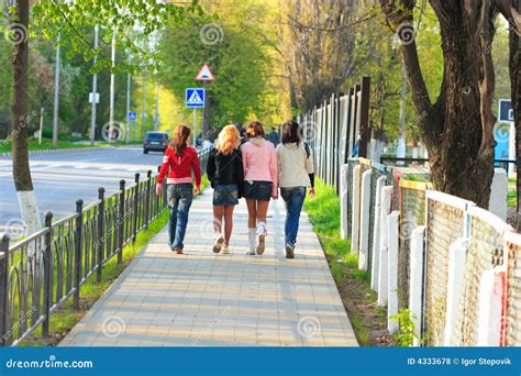 Four Girls Walking Along The Street Editorial Stock Photo Image Of