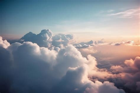 Premium Photo | The view from the plane reveals white clouds at sunset