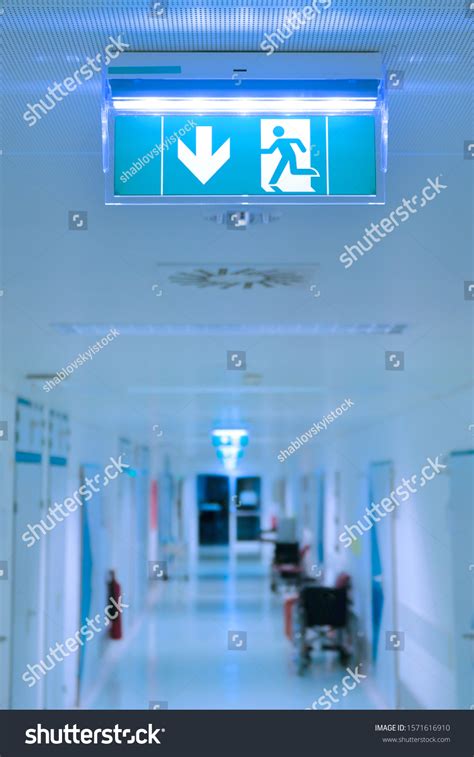 Empty Hospital Hallway Exit Sign Medical Stock Photo 1571616910 ...