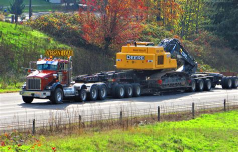 Semitrckn — Kenworth custom T800 heavy haul with a Deere on...