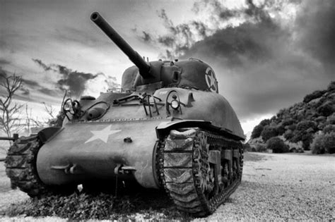 Premium Photo Tank Against Cloudy Sky