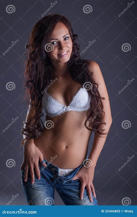 Beautiful Curvy Brunette Posing In Bra And Jeans Stock Image Image Of