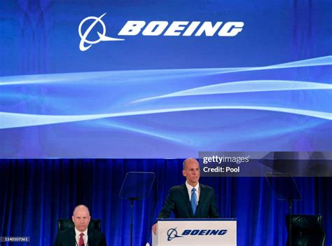 Boeing Chief Executive Dennis Muilenburg Right Speaks During The